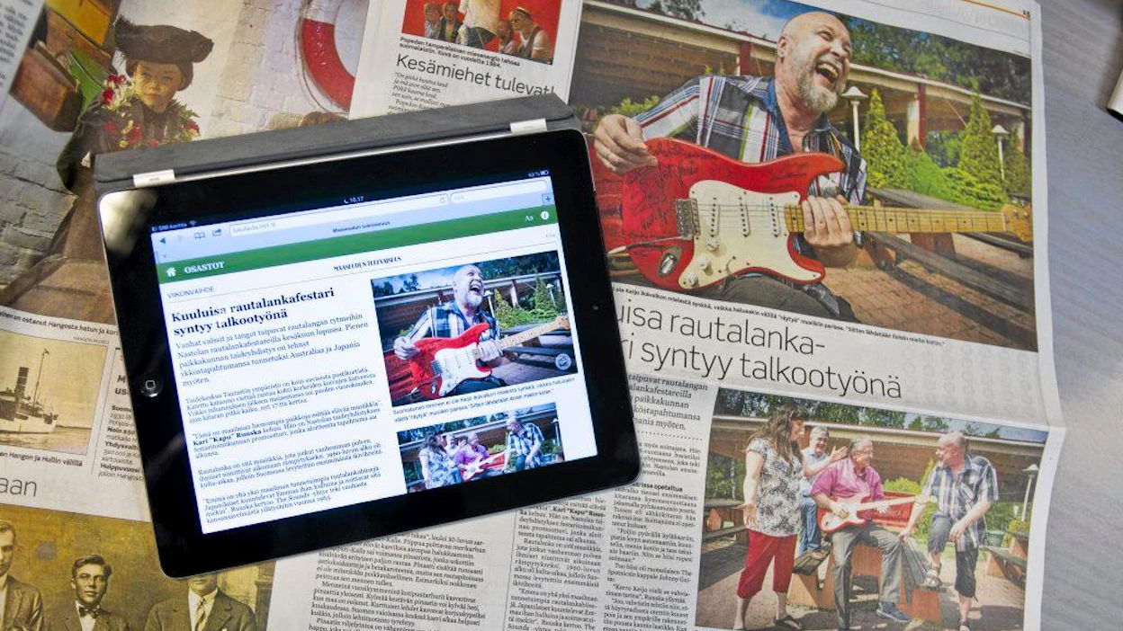 Lukulauta Maaseudun Tulevaisuuden sivu painettuna ja iPad