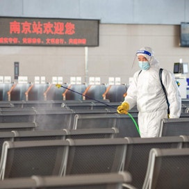 Kiina yrittää tukahduttaa virusta kovin ottein ennen Pekingin talviolympialaisia kolmen viikon kuluttua. Lehtikuva/AFP