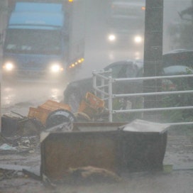 Rankkasateet ovat aiheuttaneet maanvyöryjä ja tulvia Japanissa. LEHTIKUVA / AFP
