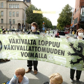 Elokapinan mielenosoittajille ei määrätty rangaistusta viime elokuisen mielenosoituksen tapahtumista Tampereella. LEHTIKUVA / KALLE PARKKINEN