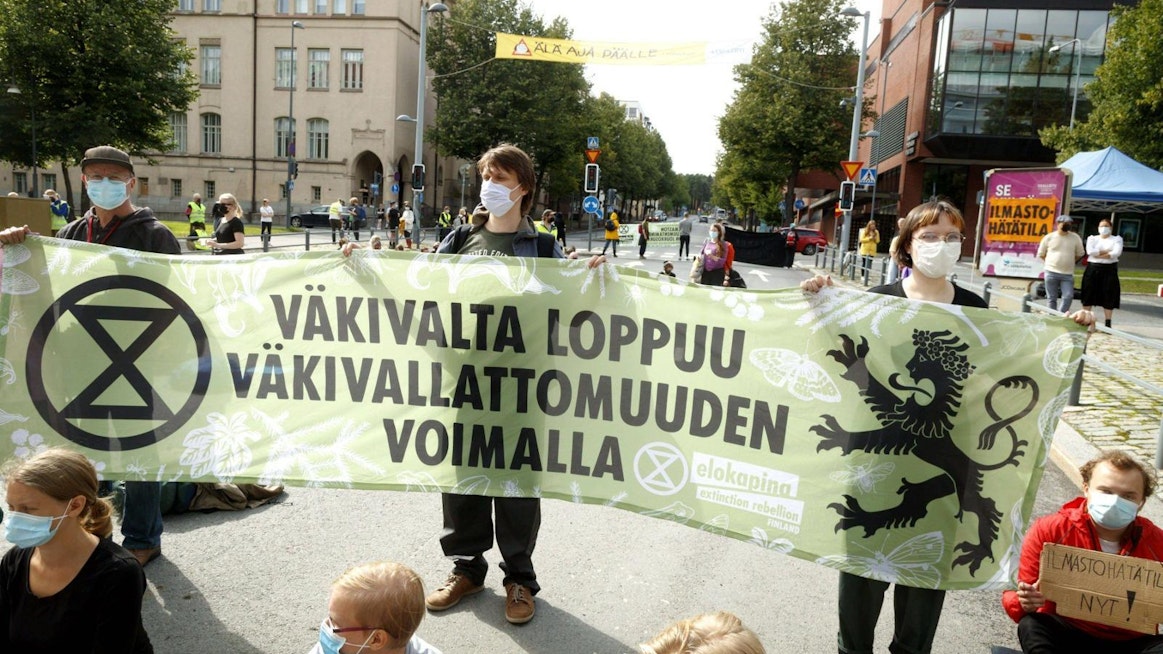 Elokapinan mielenosoittajille ei määrätty rangaistusta viime elokuisen mielenosoituksen tapahtumista Tampereella. LEHTIKUVA / KALLE PARKKINEN