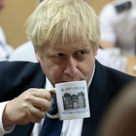 Johnson sanoo, että Britannia lähtee EU:sta lokakuun viimeinen päivä sopimuksella tai ilman sitä. Lehtikuva/AFP