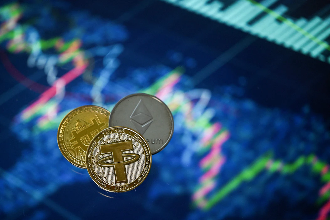 Viime vuoden verotuksessa noin 16 000 suomalaista ilmoitti käyneensä kauppaa kryptovaluutoilla. LEHTIKUVA/AFP.