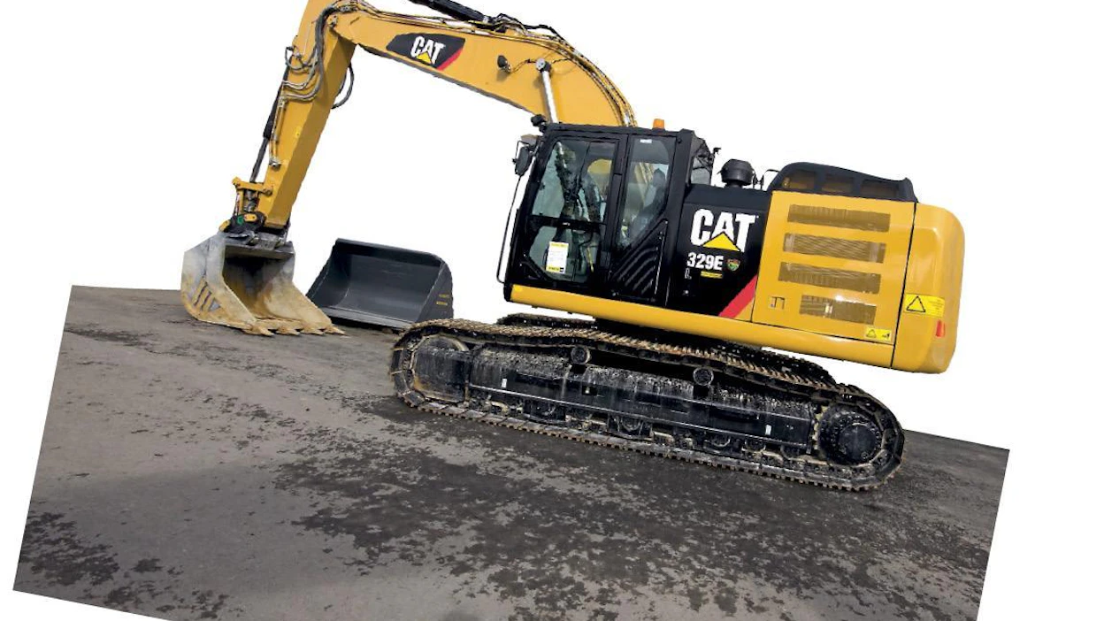 Uutena E-sarjalaisen esiteltiin massiivisen näköinen Cat 329E.Työpainoa on noin 30 tonnia.
