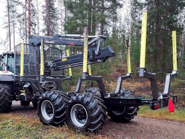 Riekkisen vaunu on muutoin ulkoisesti samannäköinen kuin hydraulisella välityksellä varustettu rinnakkaisversio, mutta sermin alapuolelta puuttuu vaunun ohjausventtilistö ja öljysäiliö. Y-aisan yhteydessä on myös sylinterit, jotka lukitsevat vaunun ja poistavat tukijalkojen tarpeen.