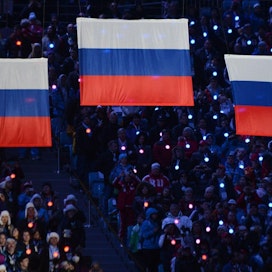 Presidentti Vladimir Putinin mukaan Venäjän olympiakomitean toimissa ei ole mitään paheksuttavaa ja maan pitäisi osallistua kilpailuihin oman lippunsa alla. LEHTIKUVA/AFP