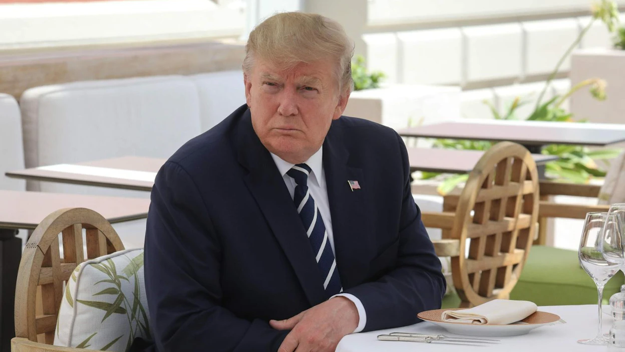 Presidentti kysyi eräässä hurrikaaneja koskevassa tilannekatsauksessa asiantuntijoilta, voiko Afrikan rannikolla muodostuvaa hurrikaania häiritä pudottamalla myrskyn silmään ydinpommin. LEHTIKUVA/AFP