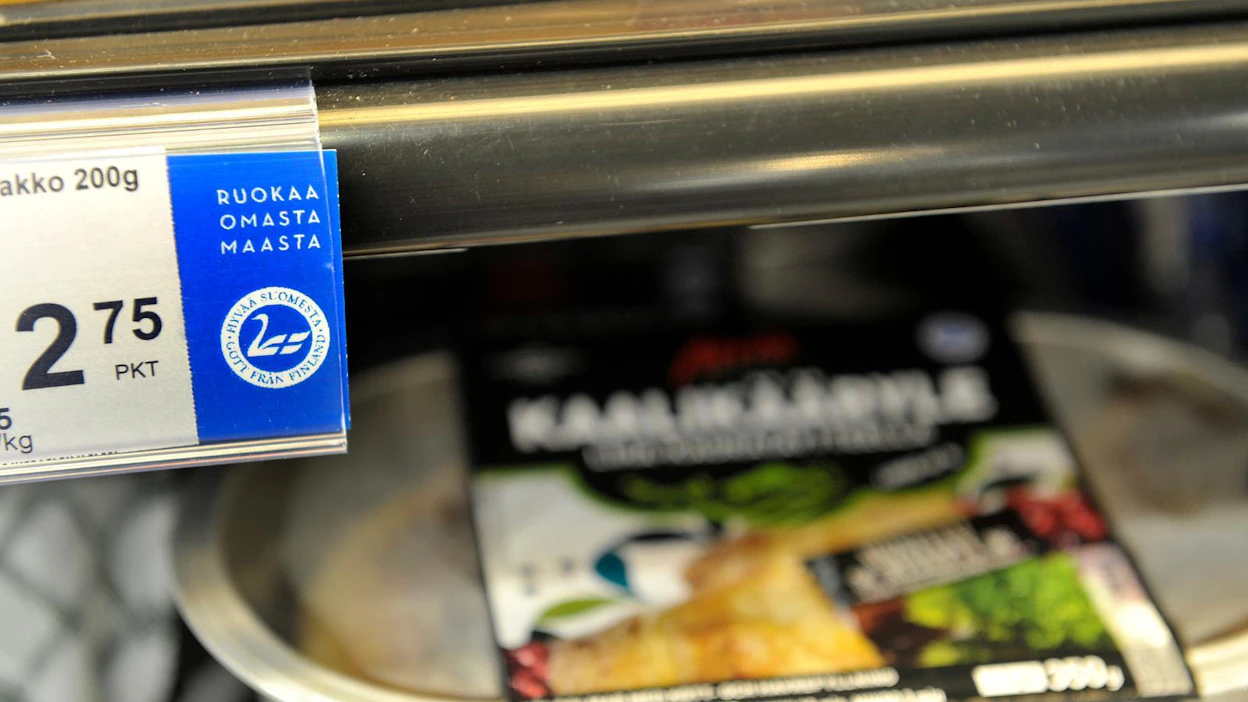 Hyvää Suomesta -merkki, suomalaisen ruuan tunnus, toimii päivän allekirjoittajana.