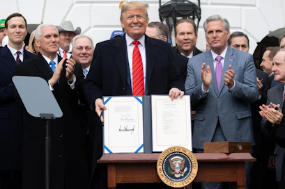 Sopimuksen solmimista pidetään kauppapoliittisena voittona presidentti Donald Trumpille. LEHTIKUVA/AFP