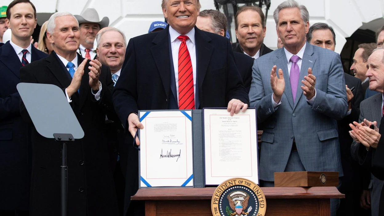 Sopimuksen solmimista pidetään kauppapoliittisena voittona presidentti Donald Trumpille. LEHTIKUVA/AFP