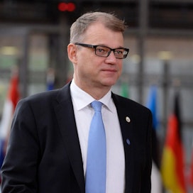 Keskustan kannattajat olivat selvästi muita luottavaisempia Juha Sipilän (kesk.) johtaman hallituksen kyvykkyyteen. LEHTIKUVA/AFP