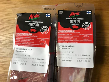 Kuvituskuva, Atrian sianlihapakkauksia menossa Kiinaan.