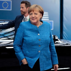 Merkelin mukaan tulossa on niin kutsuttu 19+1-julkilausuma. Lehtikuva/AFP