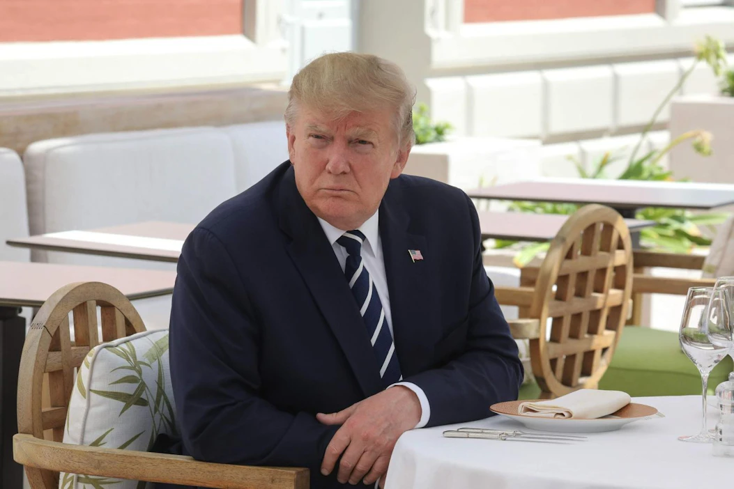 Presidentti kysyi eräässä hurrikaaneja koskevassa tilannekatsauksessa asiantuntijoilta, voiko Afrikan rannikolla muodostuvaa hurrikaania häiritä pudottamalla myrskyn silmään ydinpommin. LEHTIKUVA/AFP