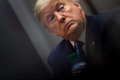 Trumpia on viime aikoina arvosteltu kovasanaisesti koronaviruspandemian hoitamisesta. LEHTIKUVA/AFP