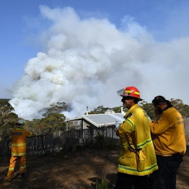 Uuden Etelä-Walesin alueella on varoitettu hätätiedotteilla uusista paloista. LEHTIKUVA/AFP