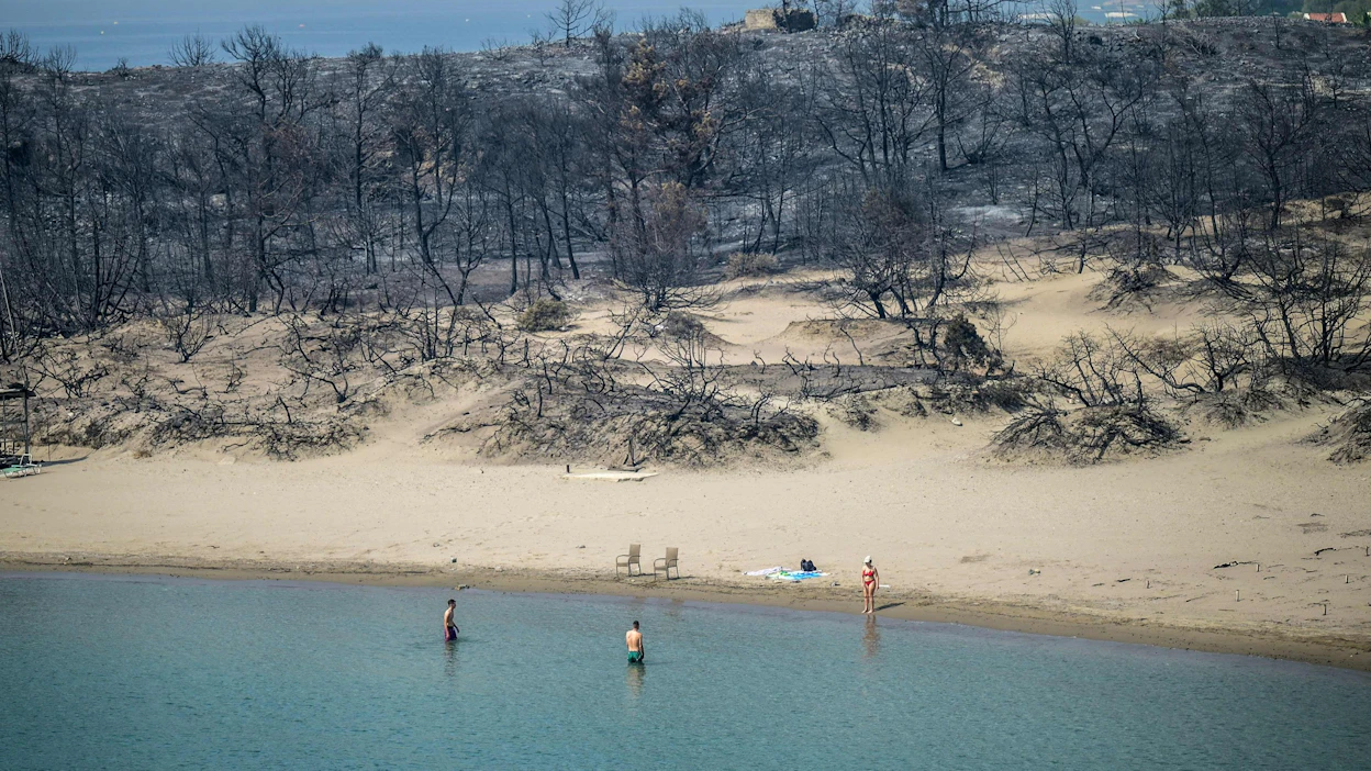 Kuluvasta heinäkuusta tulee luultavasti mittaushistorian kuumin kuukausi, YK:n ja EU:n ilmastoa tarkkailevat järjestöt sanovat. Kuva Rodoksen saarelta Kreikasta. LEHTIKUVA/AFP.