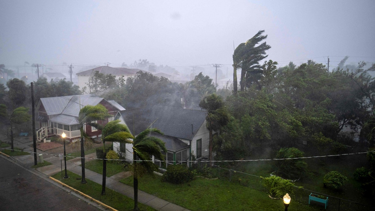 Hurrikaani Ian on tuonut voimakkaiden tuulien lisäksi mukanaan sateita sekä aiheuttanut tuhoisia tulvia. LEHTIKUVA/AFP. 