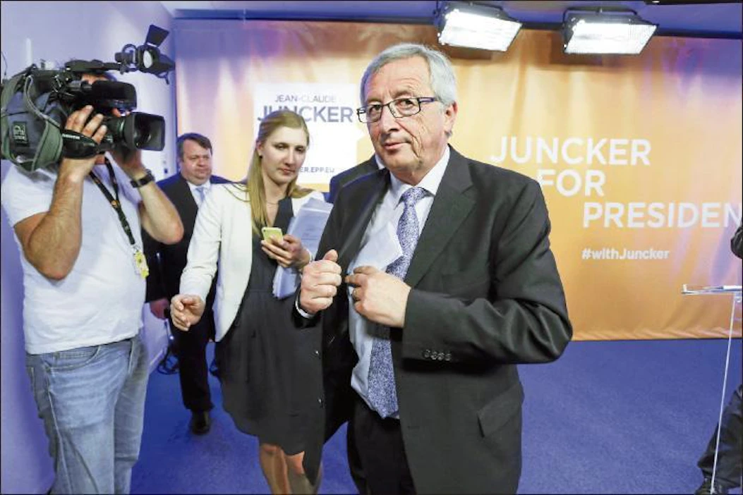 Konservatiivien luxemburgilainen kärkiehdokas Jean-Claude Juncker julisti itsensä EU-komission puheen-johtajaksi heti sunnuntai-iltana, kun EPP-ryhmän ykköspaikka oli ratkennut. Thierry Roge