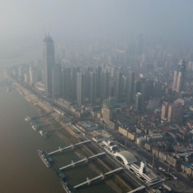 Uudenlainen koronavirus alkoi levitä Wuhanin kaupungista Kiinassa viime vuonna. Lehtikuva/AFP