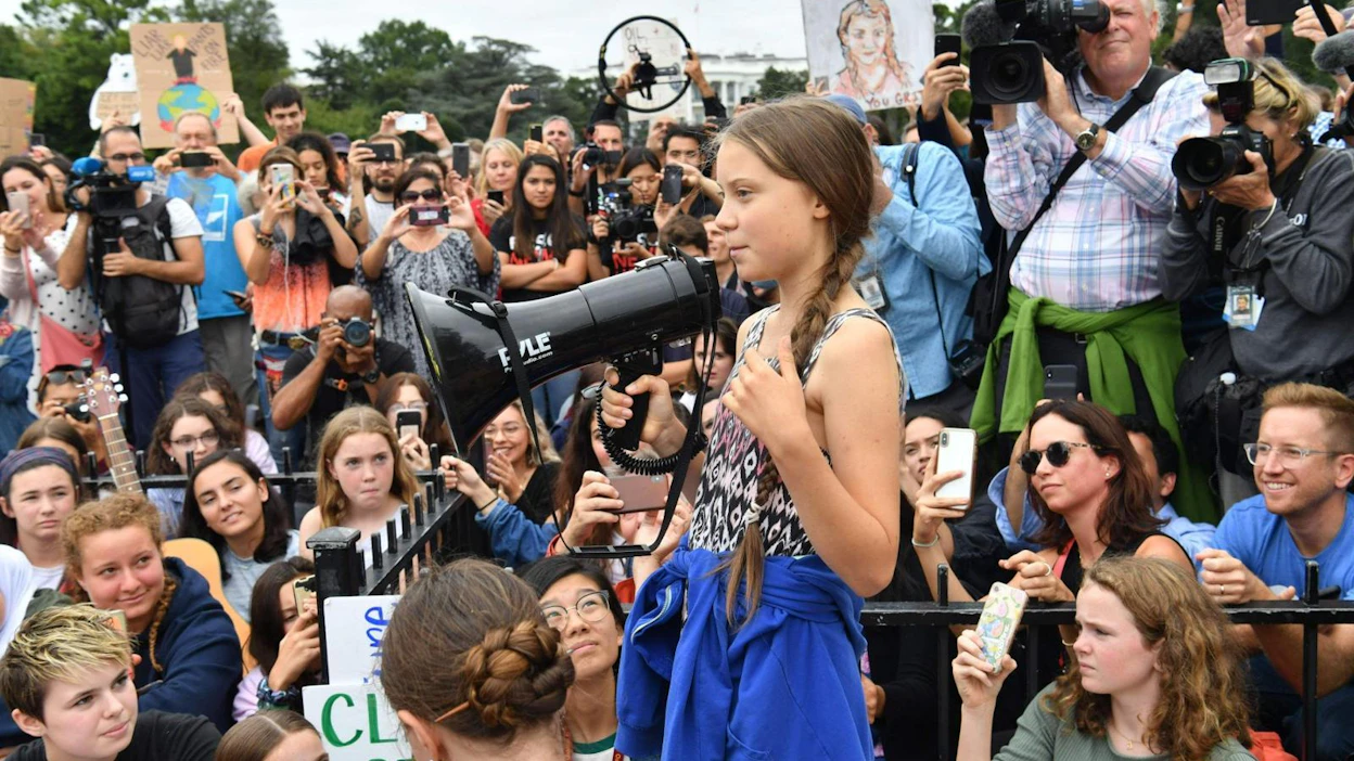 Greta Thunberg puhumassa ilmastomielenosoituksessa Valkoisen talon lähellä Washingtonissa 13. syyskuuta. LEHTIKUVA/AFP