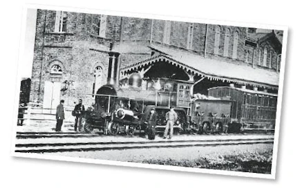 Juna lähdössä Hämeenlinnan asemalta vuonna 1865. Kuva: Suomen Rautatiemuseo