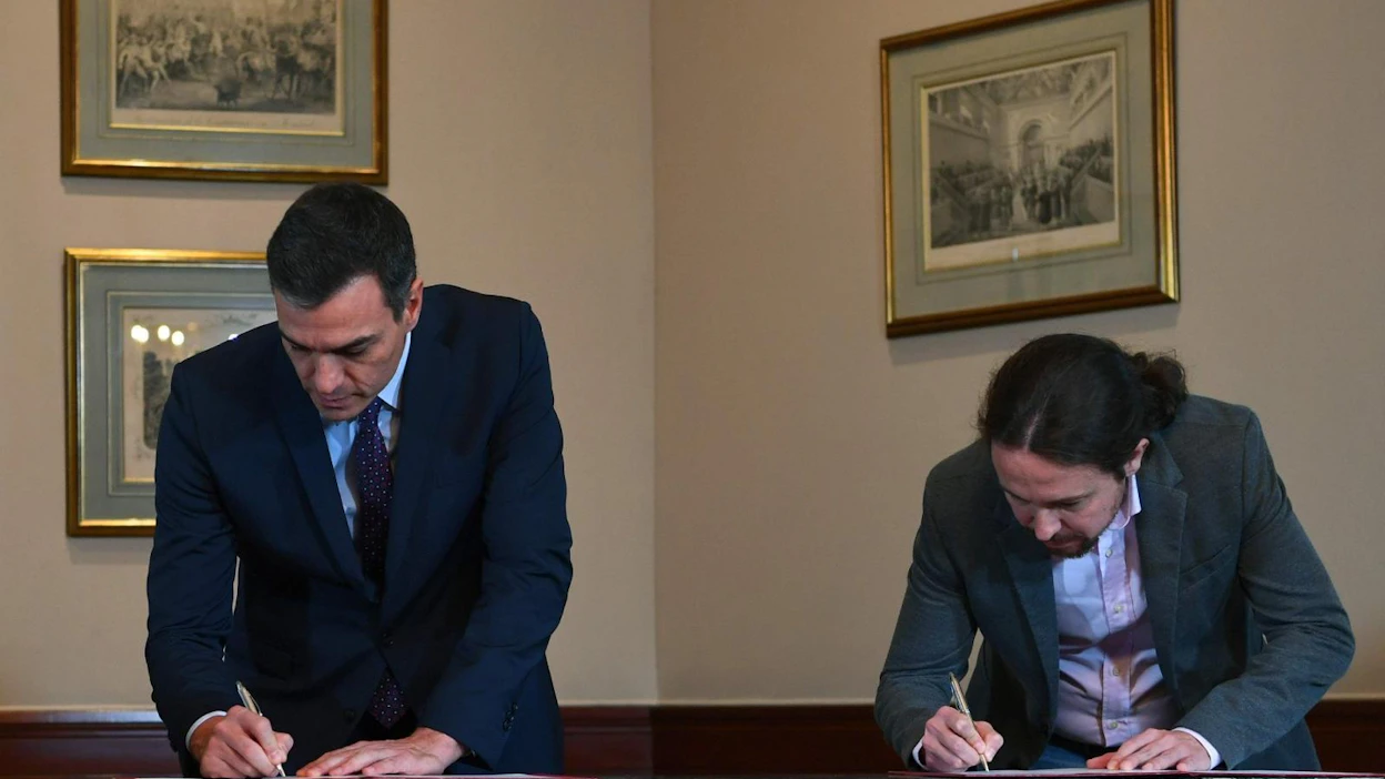 Pääministeri Pedro Sanchez ja Podemosin johtaja Pablo Iglesias sopivat yhteistyöstä tänään. LEHTIKUVA/AFP