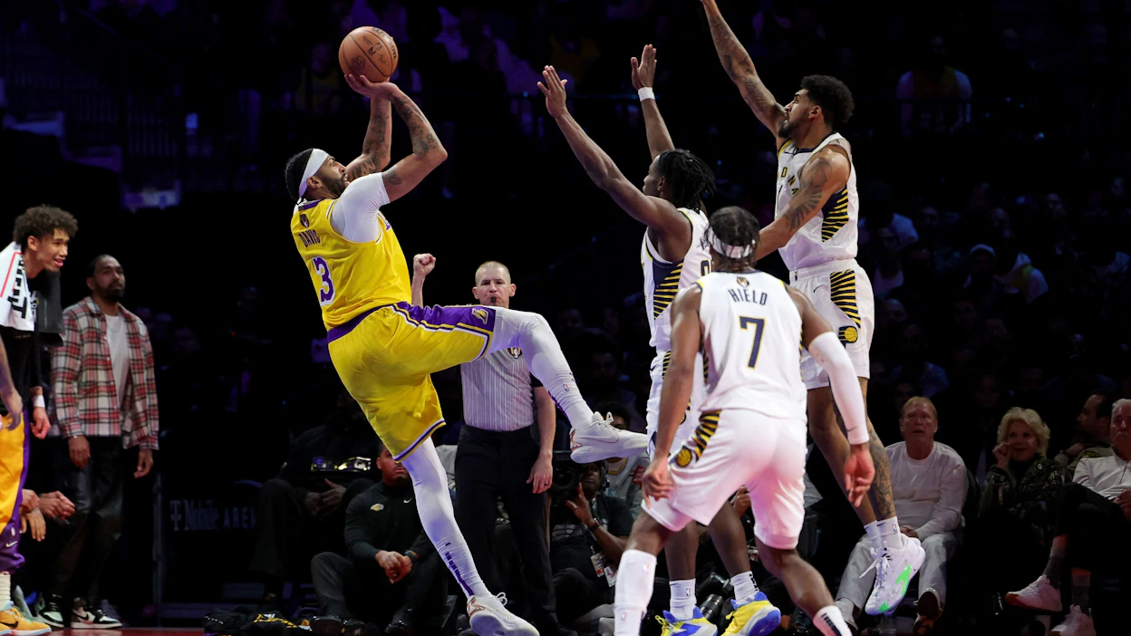 Los Angeles Lakersin tehokkain pelaaja oli 41 pistettä kahminut Anthony Davis (vas.). LEHTIKUVA / AFP.