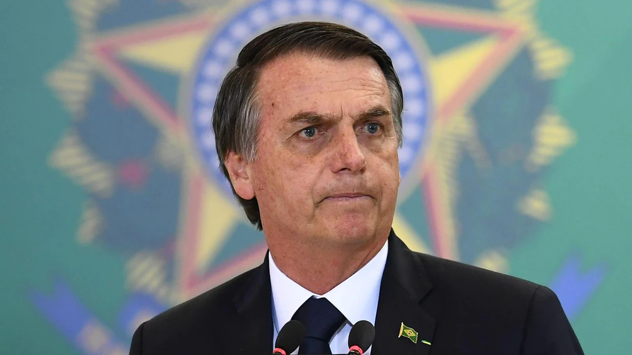 Presidentti Jair Bolsonaro vihjaa, että rahoituksen leikkauksista kärsineet ympäristöjärjestöt olisivat Brasilian metsäpalojen takana. LEHTIKUVA / AFP