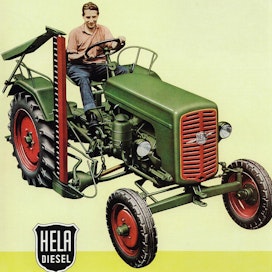 Saksassa oli kaksi Lanz-tehdasta, joista vähemmän tunnettu oli Aulendorfissa vuosina 1929–78 toiminut Herman Lanz GmbH. Sekaannusten välttämiseksi traktorit markkinoitiin Hela-merkkisinä. Maanviljelyskauppa Oy suunnitteli 2-sylinterisen 28 hv:n mallin tuontia, mutta D-markkoja myönnettiin vain kolmeen esittelytraktoriin.