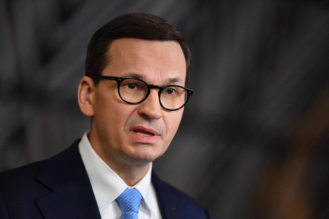 Pääministeri Mateusz Morawieckin mukaan vero auttaisi kilpailua Euroopan sisämarkkinoilla toimimaan tasapuolisemmin. LEHTIKUVA/AFP