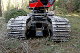 Komatsun tuotevalikoima laajeni metsäkoneisiin vuosituhannen alussa.